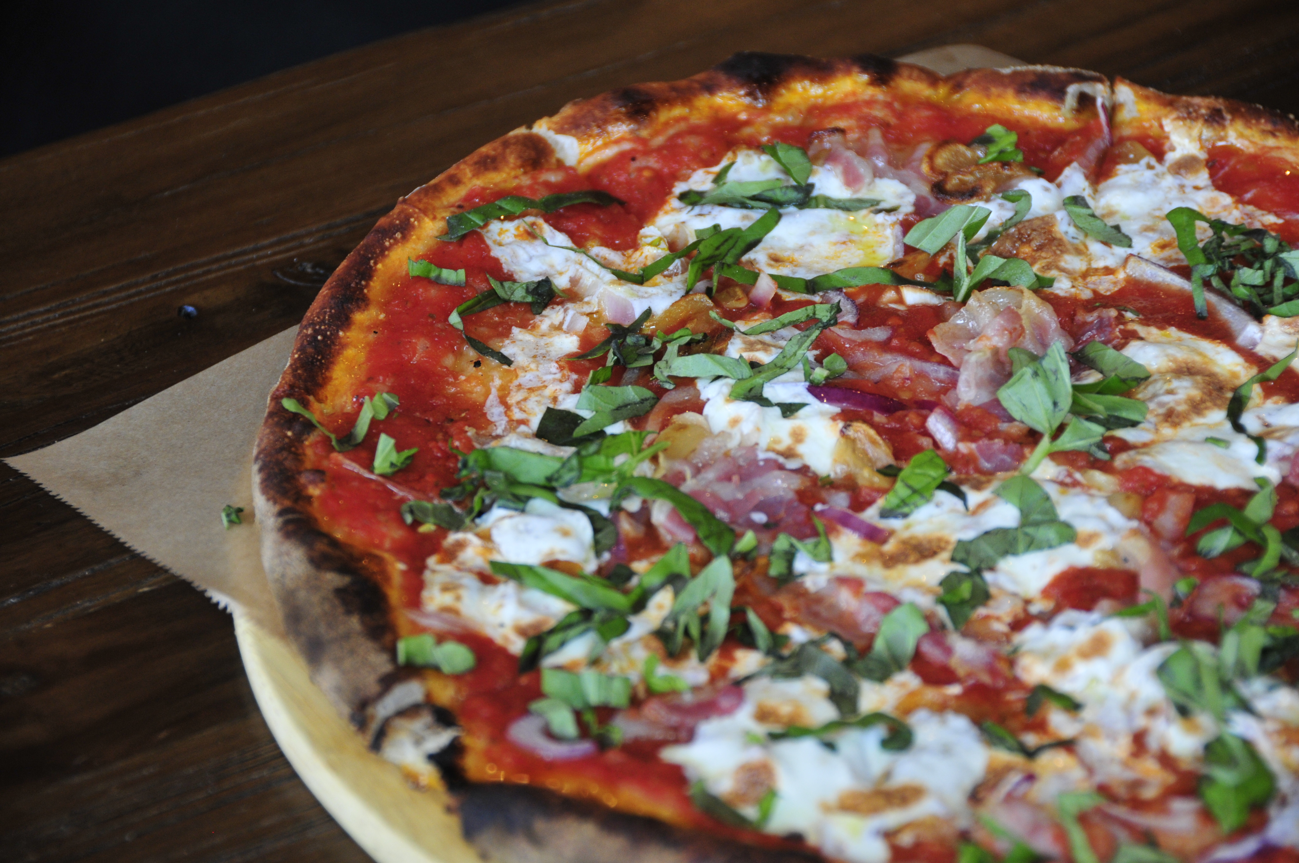 meaty pizza with basil